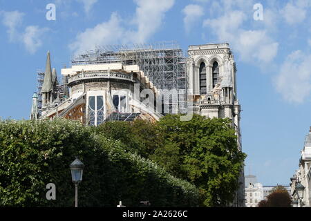 Notre-Dame de Paris undergoing renovation and restoration in September 2019. The roof of Notre-Dame caught fire on the evening of 15 April 2019. Burning for around 15 hours, the cathedral sustained serious damage. on 16 July, 2019, the French Parliament passed a law requiring that it be rebuilt exactly as it appeared before the fire. Stock Photo