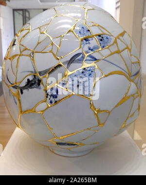 Translated Vase by Yeesookyung (b. 1963), Republic of South Korea, 2014. made from porcelain fragments, epoxy, lacquer, and gold leaf. The “Translated Vase” series was first exhibited in 2001. The artist translates (recycles), rejected objects to make new, whole works. Stock Photo