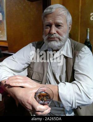 Waxwork sculpture depicting Ernest Miller Hemingway (July 21, 1899 – July 2, 1961) was an American journalist, novelist, and short-story writer. His economical and understated style—which he termed the iceberg theory—had a strong influence on 20th-century fiction, Stock Photo