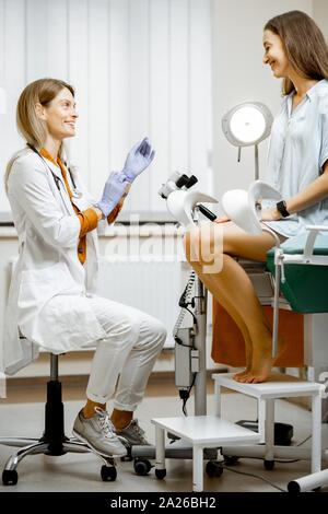 Gynecologist Preparing For An Examination Procedure For A Pregnant