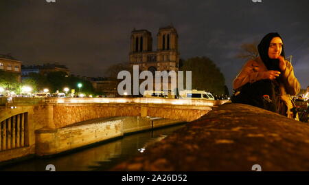 Scene showing the impact of the fire which damaged Notre Dame Cathedral on the night the fire was extinguished. Stock Photo