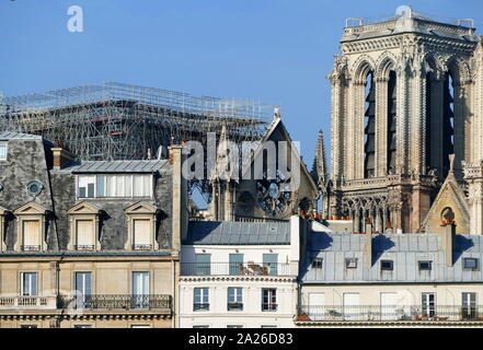 Scene showing the impact of the fire which damaged Notre Dame Cathedral the morning after the fire was extinguished. The destruction of the roof can be seen Stock Photo