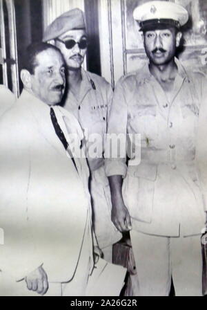 Left to right: Ali Maher, Salah Salem and Anwar Sadat. Prime Minister Maher of Egypt received from Sadat and Saleh the abdication terms for King Farouk during the 1952 Revolution. Sadat became President of Egypt, from 1970 until his assassination by fundamentalist army officers on 6 October 1981. Stock Photo