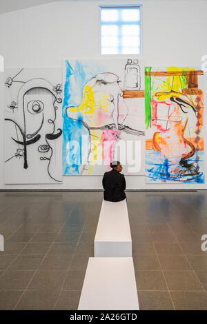 London, UK. 1st Oct 2019. At the centre is an installation that marks the beginning of Oehlen’s process of interpreting the Rothko Chapel in Houston, Texas. Four new paintings – the same scale and size as the four horizontal canvases found in the Chapel – they have been made specifically for this exhibition. Albert Oehlen at the Serpentine Gallery. He has been a key figure in contemporary art since the 1980s. Credit: Guy Bell/Alamy Live News Stock Photo