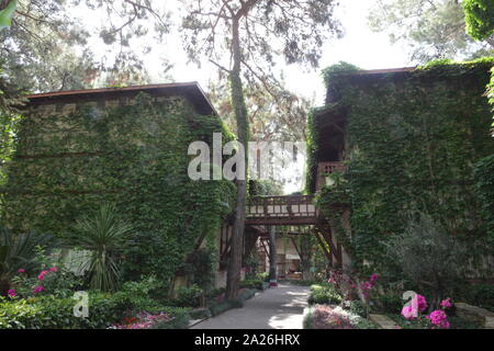 Villas decorated with flowers at luxury hotel, Crete, Greece Stock Photo