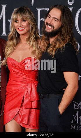 Los Angeles, United States. 01st Oct, 2019. Model, television personality and actress Heidi Klum and her husband, German guitarist Tom Kaulitz attend the premiere of the motion picture fantasy 'Maleficent: Mistress of Evil' at the El Capitan Theatre in the Hollywood section of Los Angeles on Monday, September 30, 2019. Storyline: Maleficent and her goddaughter Aurora begin to question the complex family ties that bind them as they are pulled in different directions by impending nuptials, unexpected allies, and dark new forces at play. Photo by Jim Ruymen/UPI Credit: UPI/Alamy Live News Stock Photo