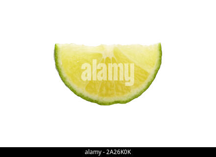 Close up one round thin cut slice of fresh green lime fruit, backlit and isolated on white background Stock Photo