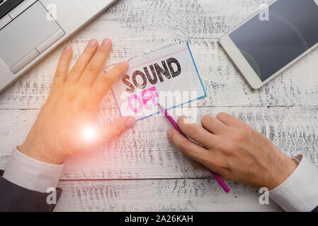 Writing note showing Sound Off. Business concept for To not hear any kind of sensation produced by stimulation Stock Photo