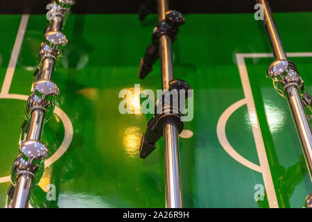 Closeup of a football with a green background Stock Photo