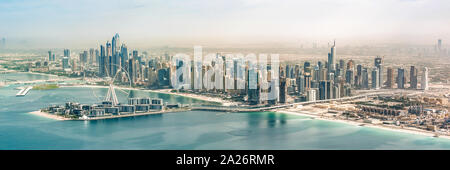 Panoramic aerial view of Dubai Marina skyline with Dubai Eye ferris wheel, United Arab Emirates Stock Photo