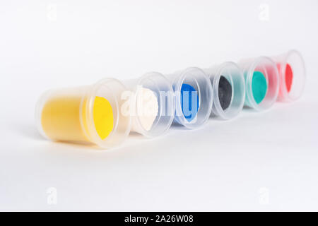 A set of colors of modeling clay isolated over a white background Stock Photo