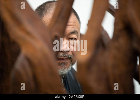 Chinese artist Ai Weiwei stand in behind 'Martin 2019' as Weiwei opens his new exhibition Ai Weiwei: Roots at the Lisson Gallery, London. Stock Photo