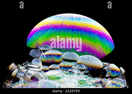 Cosmic waterfall - beautiful  soap-bubble abstract on black background Stock Photo