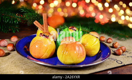 Baked Apples with Red Christmas Lighs - Panorama Stock Photo