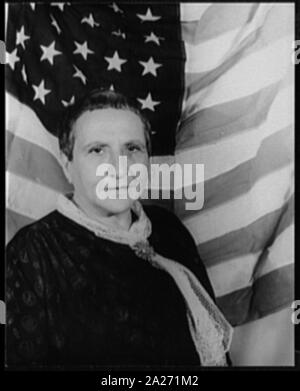 Portrait of Gertrude Stein, with American flag as backdrop Stock Photo