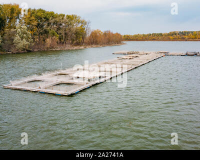 Farm for breeding fish, drone aerial view. Stock Photo