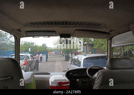 Toll gate at border crossing between Zambia and Zimbabwe, View inside a stationary combi minibus taxi, Zimbabwe. Stock Photo