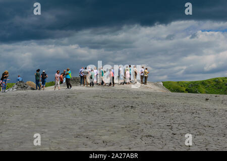 Buzau, Romania - June 29, 2019: People visiting the Mud Volcanoes in Buzau, Paclele Mari. Stock Photo