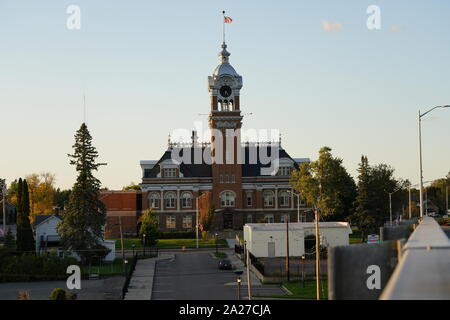 Lincoln County Courthouse clock tower. Built-in 1903 towers over Merrill Wisconsin city. Stock Photo