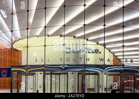 Chicago, IL, USA, October 2016: night view of the Deloitte office building on Wacker drive in Chicago. Deloitte is a multinational professional servic Stock Photo