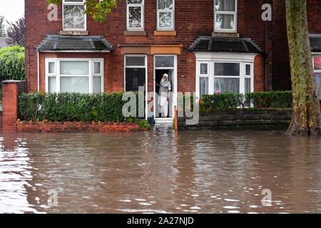 Flooding after persistent heavy rain in Alum Rock, Birmingham, as flash flooding is causing more problems for travellers on the roads and railways as further torrential thunderstorms are set to add to the misery. Stock Photo