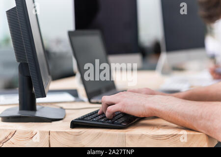close up. businessman working on a personal computer Stock Photo