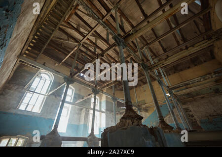 Destroyed old industrial building. Ruined house. Stock Photo