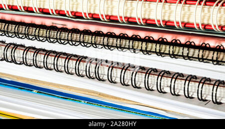 Stacked of office documents paper and notebook in the black background Stock Photo