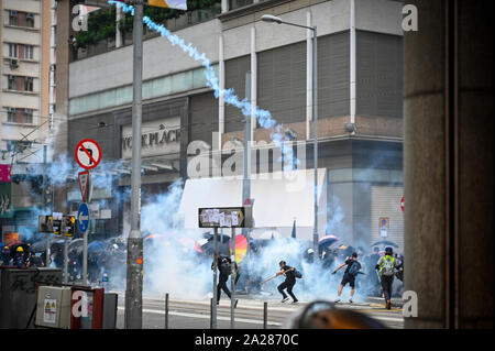 Hong Kong, China. 01st Oct, 2019. Police fire tear gas into a crowd of protesters in Hong Kong on October 1, 2019. Photo by Thomas Maresca/UPI Credit: UPI/Alamy Live News Stock Photo