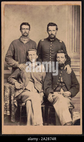 Private Thornton Reber and Lieutenant Thomas Griffith of Co. I, 159th Ohio Infantry Regiment, standing, and two unidentified soldiers, seated, in Union uniforms / Photographed by A. Weilepp, No. 19 East Baltimore Street, Baltimore, Md Stock Photo