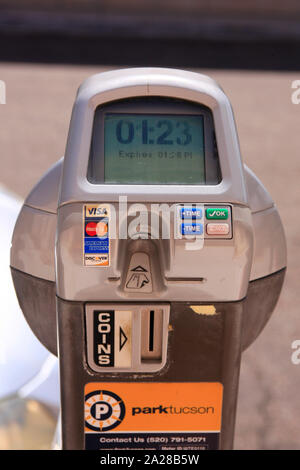 Close up of a parking meter with options to pay either with coins or a selection of accepted credit cards in Tucson AZ Stock Photo