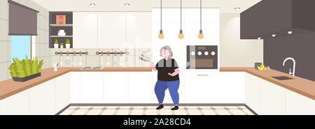 fat obese woman cooking pancakes in frying pan unhealthy nutrition obesity concept overweight girl preparing breakfast modern kitchen interior flat Stock Vector