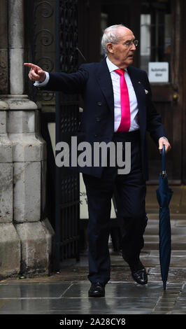 Sir Frederick Barclay (left) leaves the High Court in London, follow a preliminary hearing in the Family Division of the court on Tuesday, over a row over money with his estranged wife Lady Hiroko Barclay. Stock Photo