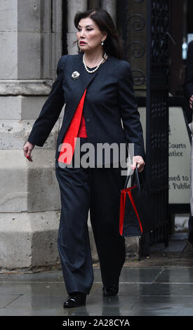 Lady Hiroko Barclay (left) leaves the High Court in London, follow a preliminary hearing in the Family Division of the court on Tuesday, over a row over money with her estranged husband Sir Frederick Barclay. Stock Photo