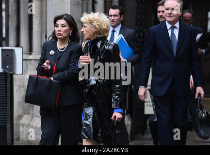 Lady Hiroko Barclay (left) leaves the High Court in London, follow a preliminary hearing in the Family Division of the court on Tuesday, over a row over money with her estranged husband Sir Frederick Barclay. Stock Photo