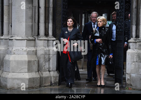 Lady Hiroko Barclay (left) leaves the High Court in London, follow a preliminary hearing in the Family Division of the court on Tuesday, over a row over money with her estranged husband Sir Frederick Barclay. Stock Photo