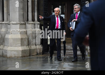 Sir Frederick Barclay (left) leaves the High Court in London, follow a preliminary hearing in the Family Division of the court on Tuesday, over a row over money with his estranged wife Lady Hiroko Barclay. Stock Photo