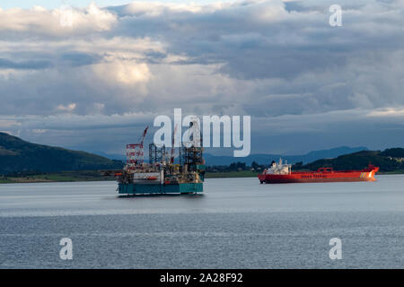 North Sea oil rig in the Norwegian North Sea off Stavanger with tanker Stena Teejay anchored nearby Stock Photo