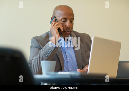 African American man having a difficult time at work. Stock Photo