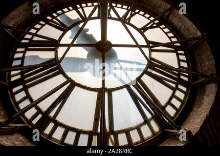 Vintage gravity driven clock tower mechanisms and dials. Stock Photo