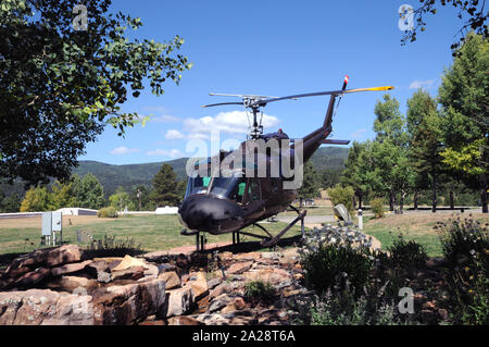 A Bell UH1 helicopter, better known as a 'Huey', on display at the Vietnam Veterans Memorial State Park near Angel Fire, New Mexico. Stock Photo