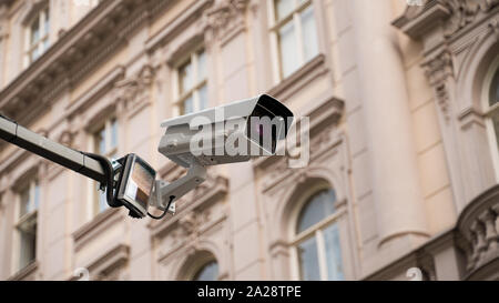 Security CCTV camera in city. Stock Photo