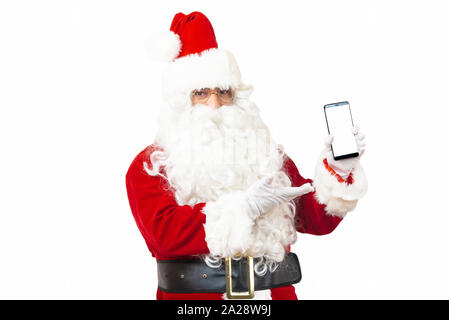 Santa Claus holding using mobile smartphone  on white background Stock Photo