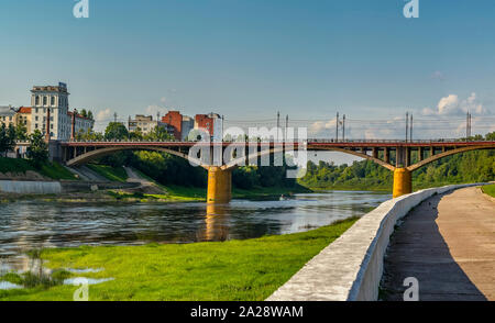 embankment of the Western Dvina river, Vitebsk. Belarus. 28.07.2019.  Kirovsky bridge is a bridge in the city center across the Western Dvina river. I Stock Photo