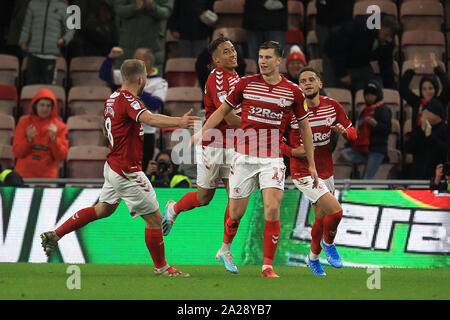 Middlesbrough, UK. 1 October 2019.  Middlesbrough's players celebrate after Preston North End's Darnell Fisher own goal levelled the scores at 1-1 during the Sky Bet Championship match between Middlesbrough and Preston North End at the Riverside Stadium, Middlesbrough on Tuesday 1st October 2019. (Credit: Mark Fletcher | MI News ) Photograph may only be used for newspaper and/or magazine editorial purposes, license required for commercial use Credit: MI News & Sport /Alamy Live News Stock Photo