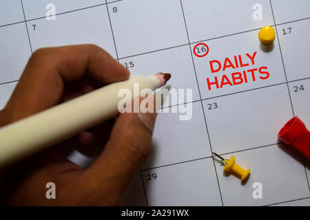 Exercise Daily Sign on white paper. Man Hand Holding Paper with text ...