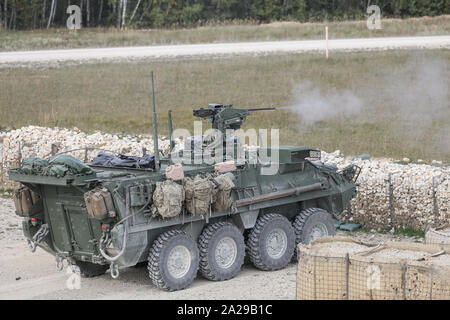 An M2 machine gun Stryker gunner with Bravo Company, 5th Battalion ...