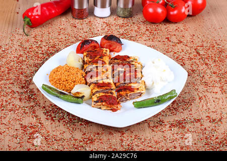 Beef kebab with fresh bread and yogurt onion and pepper Stock Photo