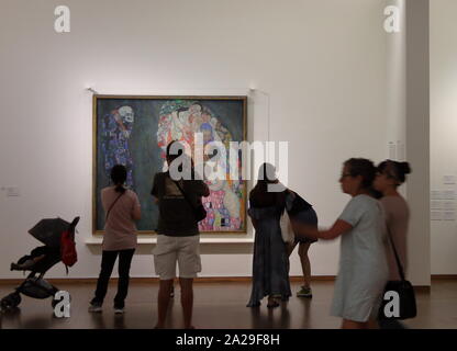 Tourists look at 'Life and Dead' from Gustav Klimt at the Leopold Museum,Vienna Stock Photo