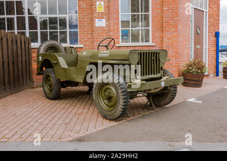 World War 2 Willys MB jeep displayed at entrance Castletown D-day Centre, Castletown, Portland, Dorset, UK Stock Photo
